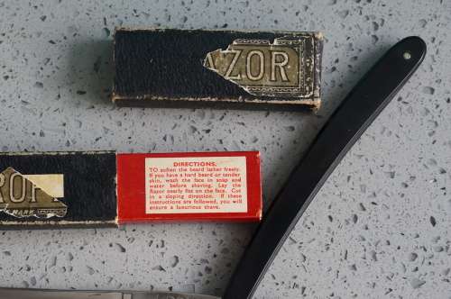 Great Kropp cut throat razor in original box!