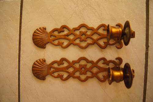 Brass wall hanging candelabra