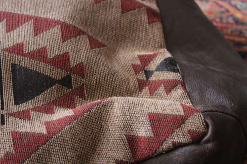 Oriental genuine leather and Kelim pouf/ottman in good condition.