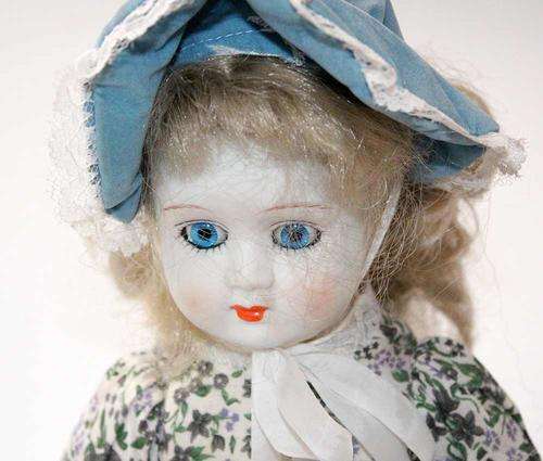 Beautiful porcelain doll.