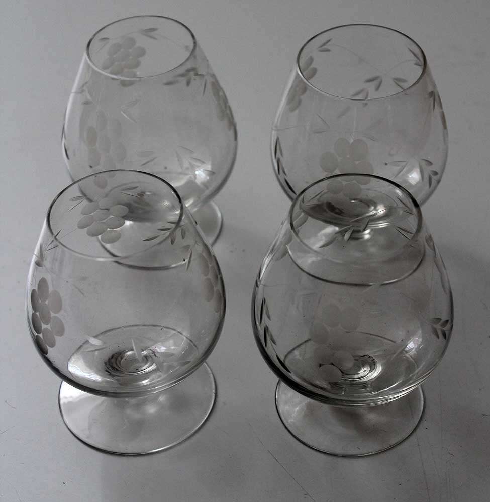 Crystal brandy goblets with vineyard motif
