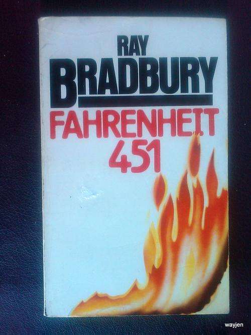FAHRENHEIT 451. RAY BRADBURY. PAPERBACK. 1983. EX SCHOOL BOOK. SOME WEAR & TEAR BUT STILL NEAT.