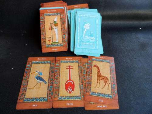 PILE OF CARDS FROM POSSIBLE THE ASTROLOGY COLLECTION. HACHETTE ISSUED BOOKS AND FILES AND FILES.