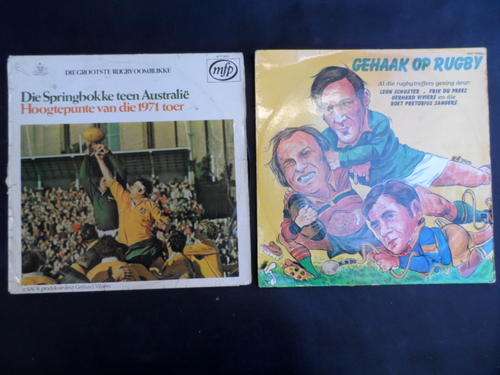 2 x SPRINGBOK RUGBY RECORDS. BOTH COVERS HAVE SOME DAMAGE. VINYLS HAVE SOME SCRATCHES.