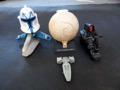 SOME STAR WARS COLLECTIBLE FIGURINES/TOYS. SOME SLIGHT WEAR.