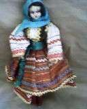 BEAUTIFUL HAND PAINTED FACE MATERIAL DOLL. RED BOOTS. 28 CM HIGH.