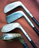 SET OF 4 CHEVRON GOLF CLUBS. 5, 6, 8 + WOOD. NOTE: CRACKS IN GRIPS AND SOME RUST. REX. USA