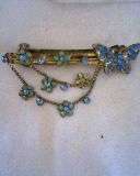 BEAUTIFUL BLUE METAL HAIR CLIP WITH BUTTERFLY AND FLOWERS.