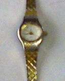 LADIES  GOLD PLATED FARAH WATCH. WORKING. 1 PIN ON CLASP MISSING BUT STILL CLOSES PROPERLY.
