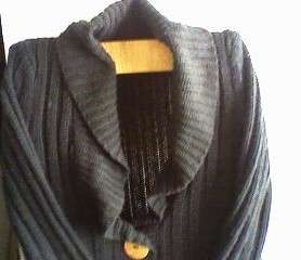 LOLA = LARGE. VERY UNIQUE BLACK JERSEY. BOUGHT IN USA.