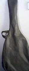 GUITAR BAG. GREY COLOUR. SOME MARKS AND A SLIGHT TEAR.