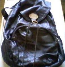 GENUINE LEATHER BACKPACK WITH OUTSIDE POCKET BY MOONBAGS. NOTE: SLIGHT MARKS ON BAG.