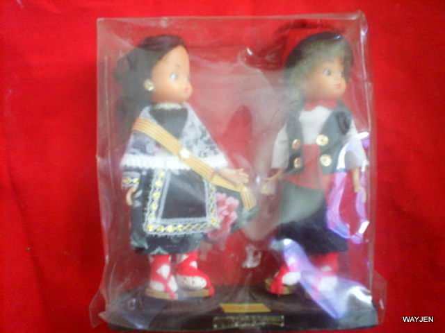 TWO DOLLS FROM CATALUNYA. IN PLASTIC BOX. BOX IS DAMAGED.