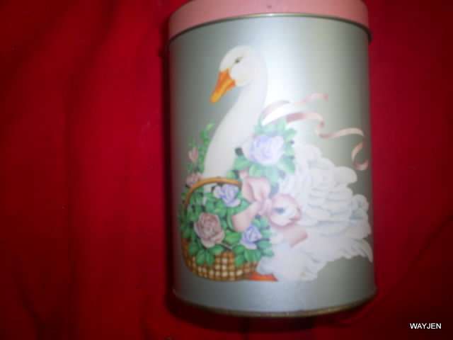 2 LOVELY SWAN METAL TINS. ONE TIN FITS INSIDE THE OTHER. VERY NEAT BUT HAS SOME RUST AROUND THE EDGE