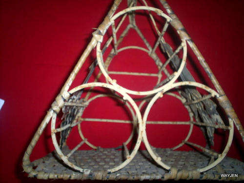 VINTAGE WIRE/STEEL AND CANE WINE BOTTLE HOLDER. HOLDS 3 BOTTLES. NEEDS A LITTLE TLC.