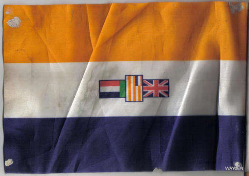 OLD SOUTH AFRICAN FLAG. 23,5 X 16cm. NOTE: FLAG IS MARKED AND HAS A TEAR IN IT.