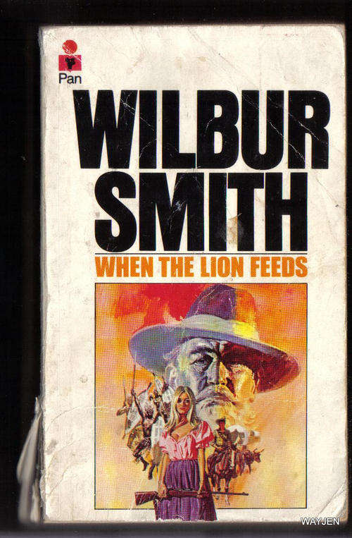 WILBUR SMITH. WHEN THE LION FEEDS.SOFTCOVER.421 PAGES. SPINE HAS A TEAR AND ONE PAGE LOOSE.