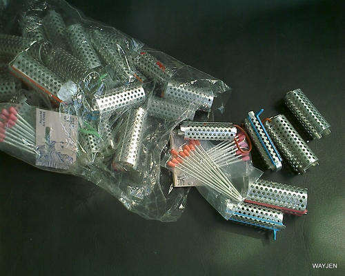 50'S METAL HAIR CURLERS AND PINS.