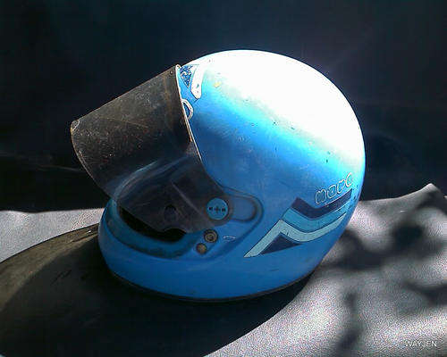 BIKE HELMET. NEEDS SOME REFURBISHING AND REPAIRS.