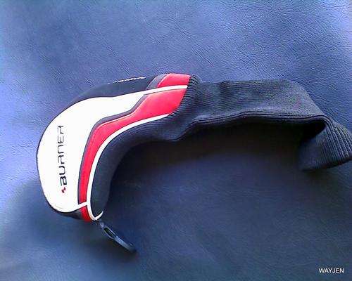 TAYLORMADE BURNER GOLF CLUB COVER. ADJUSTABLE NUMBER CHANGER FOR ANY CLUB. SLIGHT TEAR ON ONE SEAM.
