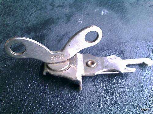 UNIQUE POCKET CAN AND BOTTLE OPENER. SKYLINE. MADE IN BURNLEY, ENGLAND. SLIGHT MARKS.