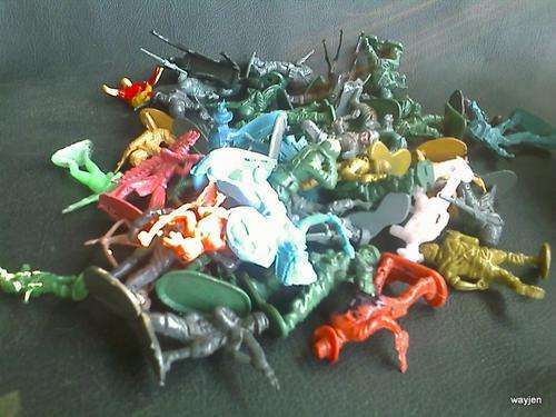 BAG OF COWBOYS AND INDIANS AND ARMY MEN. THE OLD PLASTIC KIND. SOME MIGHT HAVE SLIGHT DAMAGE.