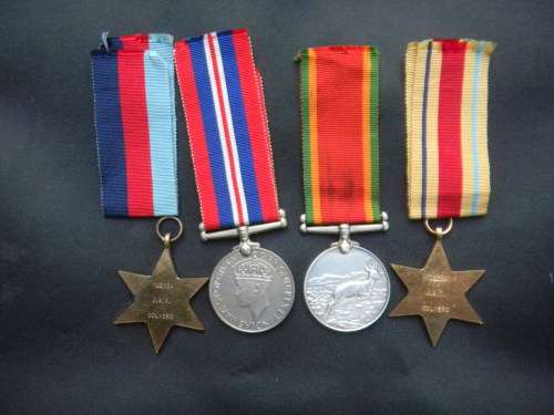 WW2 Set of 4 Medals with ribbons awarded to J A T Colverd 102234