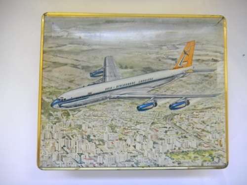 Assorted Military Badges and Insignia in collectible tin