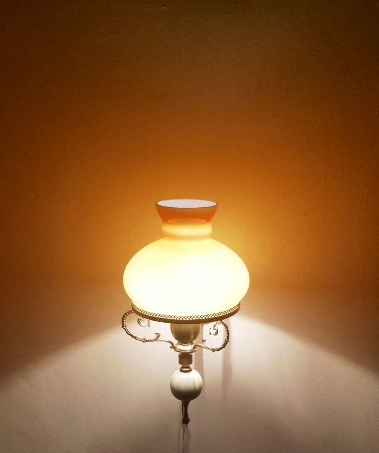 BRASS WALL SCONCE WITH AMBER COLOUR SOLID GLASS STUDENT SHADE