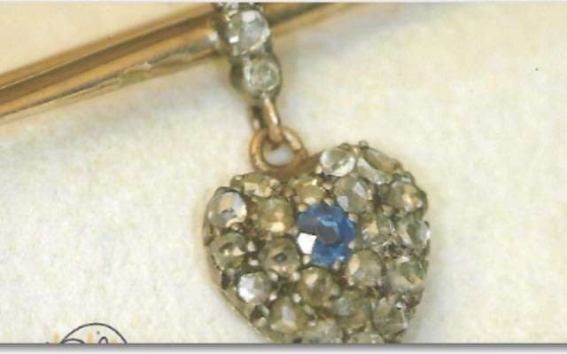 SAPPHIRE and 24 DIAMONDS HEART DESIGN BROOCH SET IN GOLD