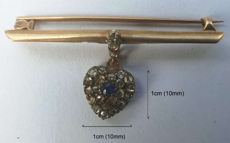 SAPPHIRE and 24 DIAMONDS HEART DESIGN BROOCH SET IN GOLD
