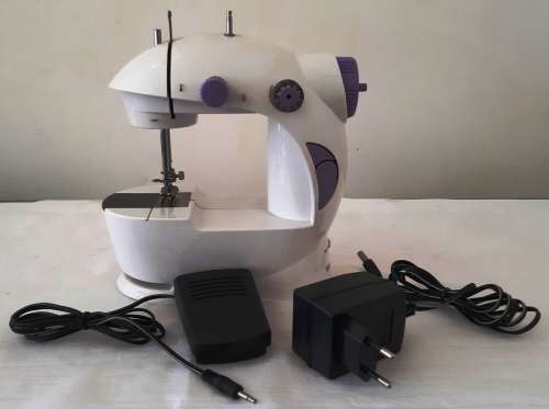 MINI ELECTRIC SEWING MACHINE ~ REQUIRES ADJUSTMENT OF TIMING