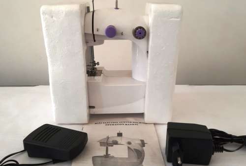 MINI ELECTRIC SEWING MACHINE ~ REQUIRES ADJUSTMENT OF TIMING