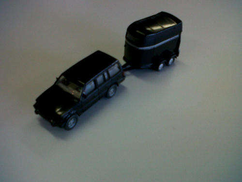 HO black 4x4 with trailer