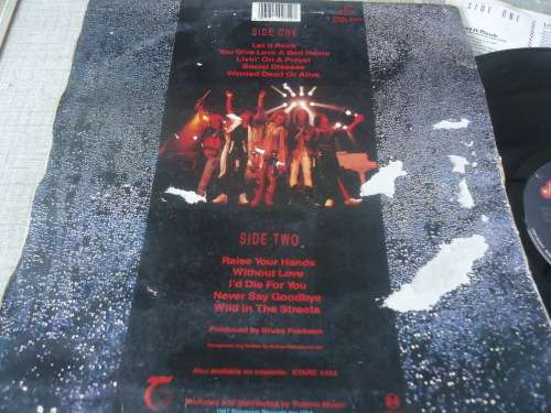 BON JOVI- SLIPPERY WHEN WET- UK IMPORT - 1986 MERCURY STEREO  LP - WORN COVER