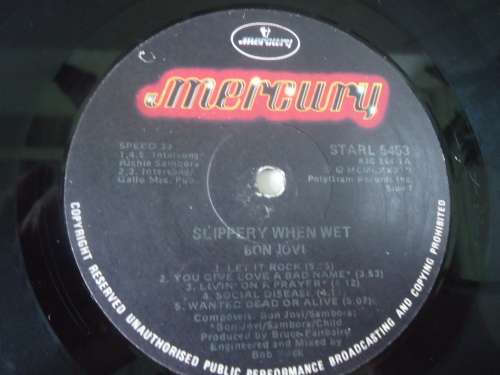 BON JOVI- SLIPPERY WHEN WET- UK IMPORT - 1986 MERCURY STEREO  LP - WORN COVER