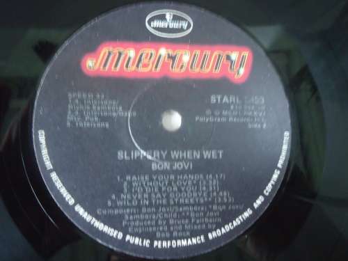 BON JOVI- SLIPPERY WHEN WET- UK IMPORT - 1986 MERCURY STEREO  LP - WORN COVER