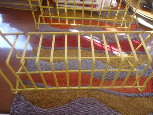 On offer YELLOW 12 CASSETTE TAPE STAND (I OF 2 AVAILABLE)