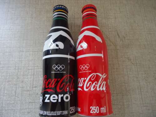 SET OF TWO OLYMPIC COCA COLA BOTTLES - SWIMMER - COKE AND COKE ZERO