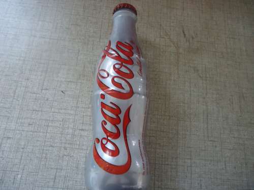 COCA COLA LIMITED EDITION BOTTLE - TO REAL PARTNERSHIPS - THANK YOU BOTTLE FULL GLASS BOTTLE