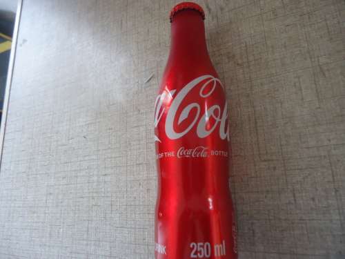 100 YEARS OF THE  COCA COLA BOTTLE