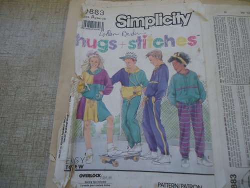 SIMPLICITY PATTERNS 9883 KID'S TRACK PULLOVER PANTS, TOP & SKIRT SIZE SMALL-LARGE 7-14 YRS COMPLETE