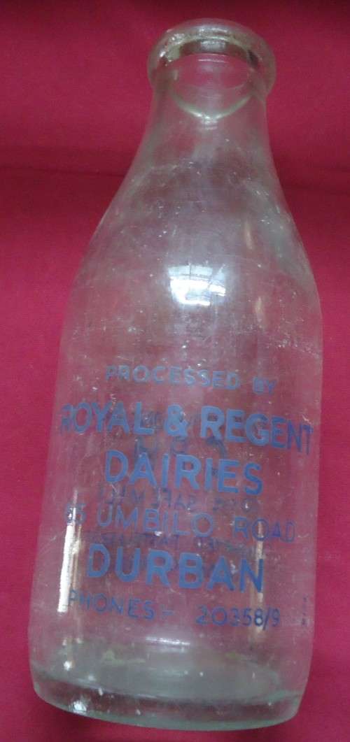 THREE DIFFERENT VINTAGE GLASS MILK BOTTLES -TWO PINT SIZE BOTTLES AND A QUART