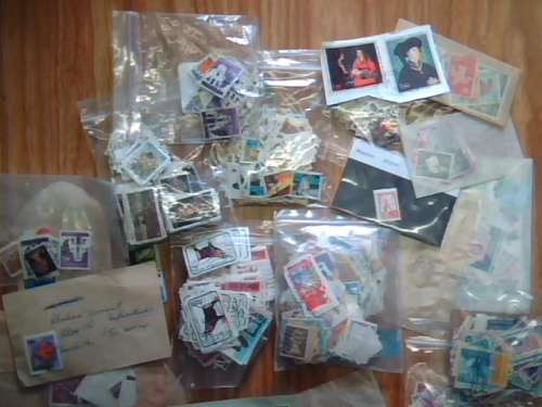 AN ACCUMULATION OF STAMPS AS SHOWN ALL SORTED INTO COUNTRIES CLEAN OUT SCANS X6