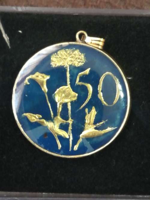 1980 50 cent colour enameled coin south africa in ms condition souvenir coin .