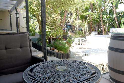 Weekend Away at Sunset Decks Guesthouse in Sunset Beach, Cape Town