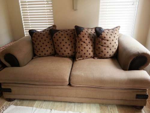 3 seater couch, with removable covers and machine washable.  Two available.  Price for one
