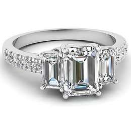 THREE STONE EMERALD CUT CZ ACCENTED RING