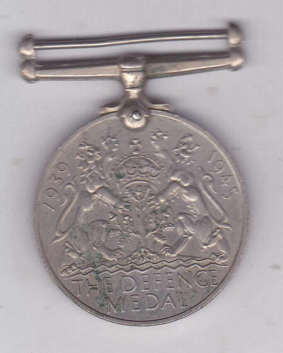 SOUTH AFRICA WWII DEFENCE MEDAL 33006 C.S. BARKER