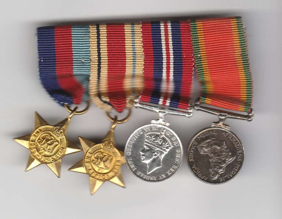 GROUP OF 4 MINIATURE MEDALS MOUNTED AS WORN - AFRICA STAR , 39-45 STAR , AFRICA SERVICE MEDAL